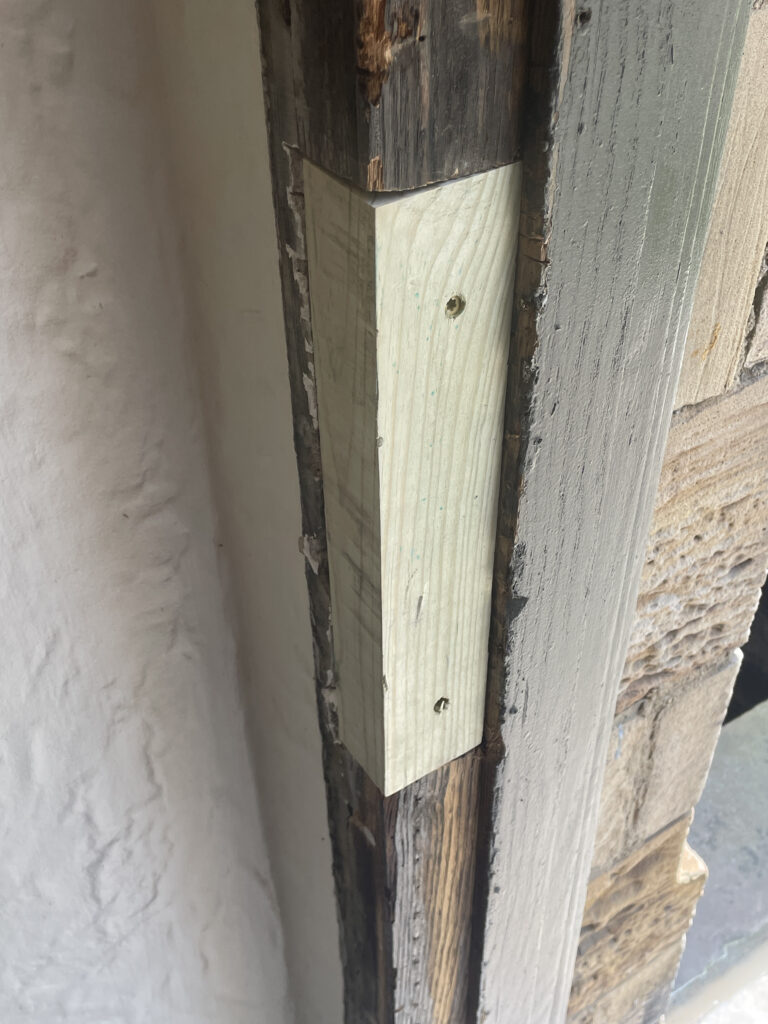 Cleveland door frame being repaired